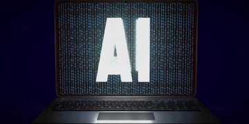 The text AI appears on the laptop screen.