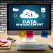 Computer Monitor Displaying Data Management Concepts with Related Icons