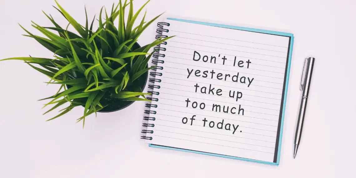 Inspirational quote in a home office setting to motivate organization efforts