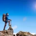 Hiker at the summit, symbolizing achieving milestones in the Programming Roadmap.