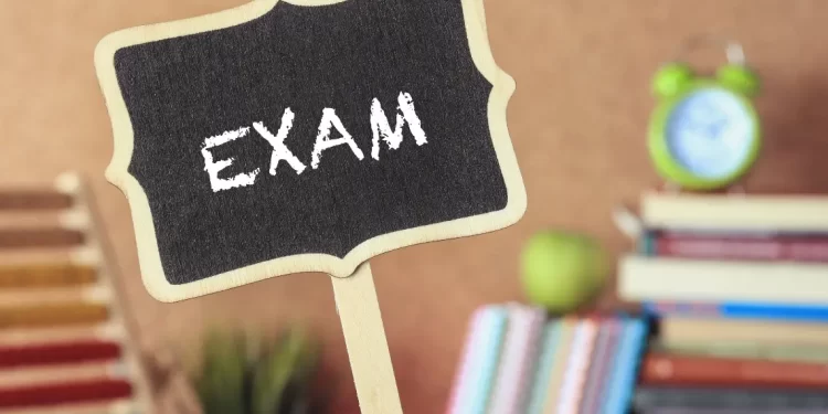 Blackboard with the word EXAM written on it
