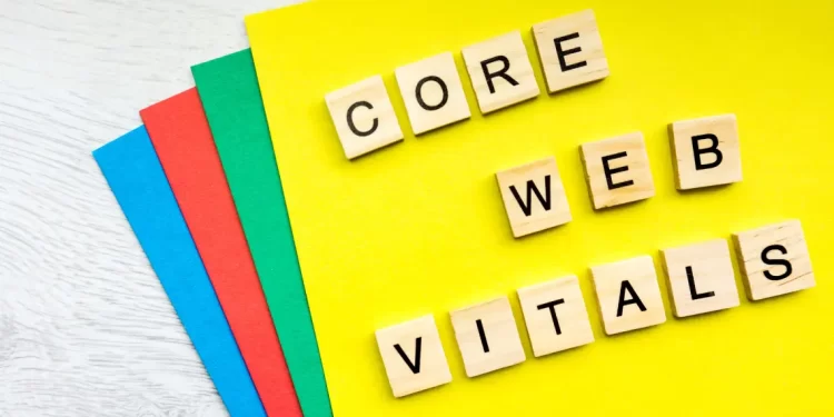 Core Web Vitals displayed with wooden letter tiles on colorful paper background